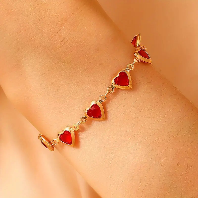 Bracciale cuore in rubino dorato