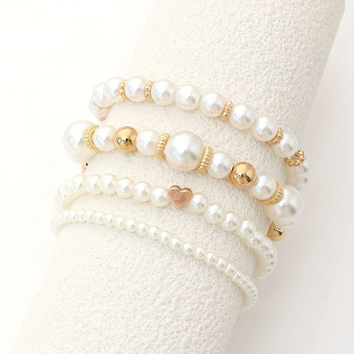 Set di bracciali eleganti a cuore con perle