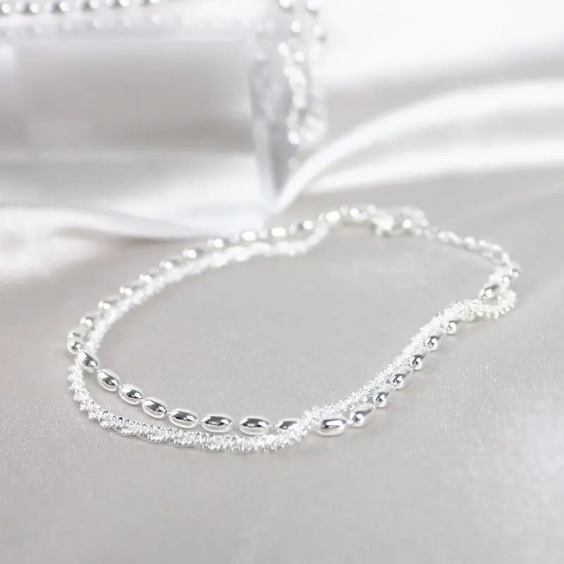 Set di bracciali eleganti in argento con zirconi