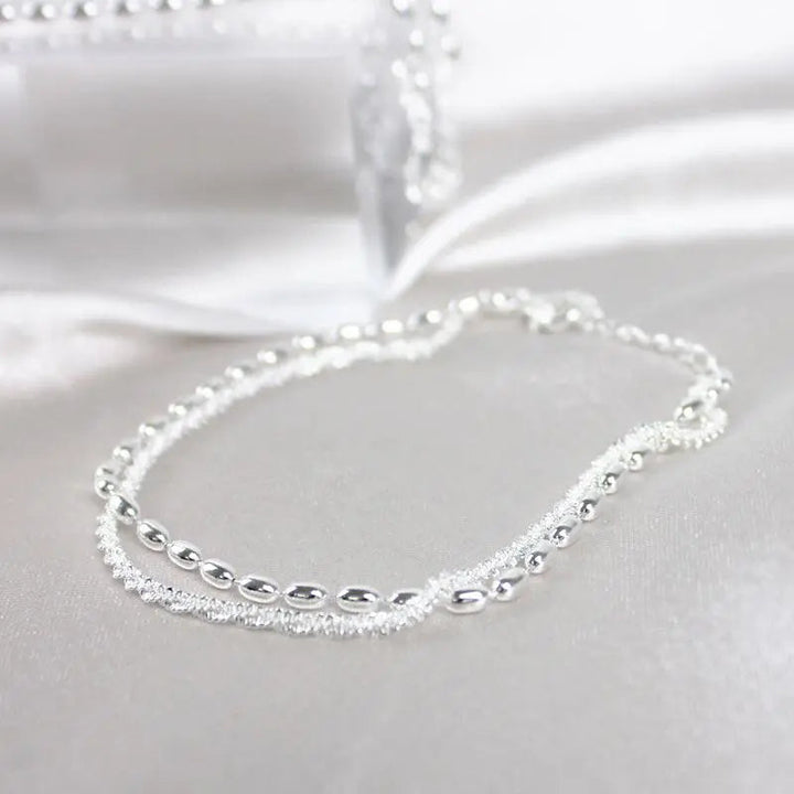 Set di bracciali eleganti in argento con zirconi
