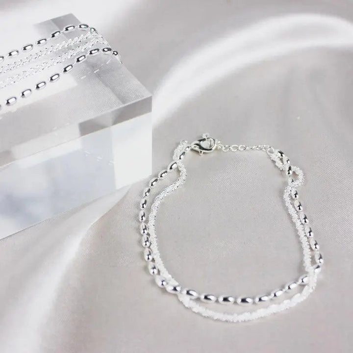 Set di bracciali eleganti in argento con zirconi
