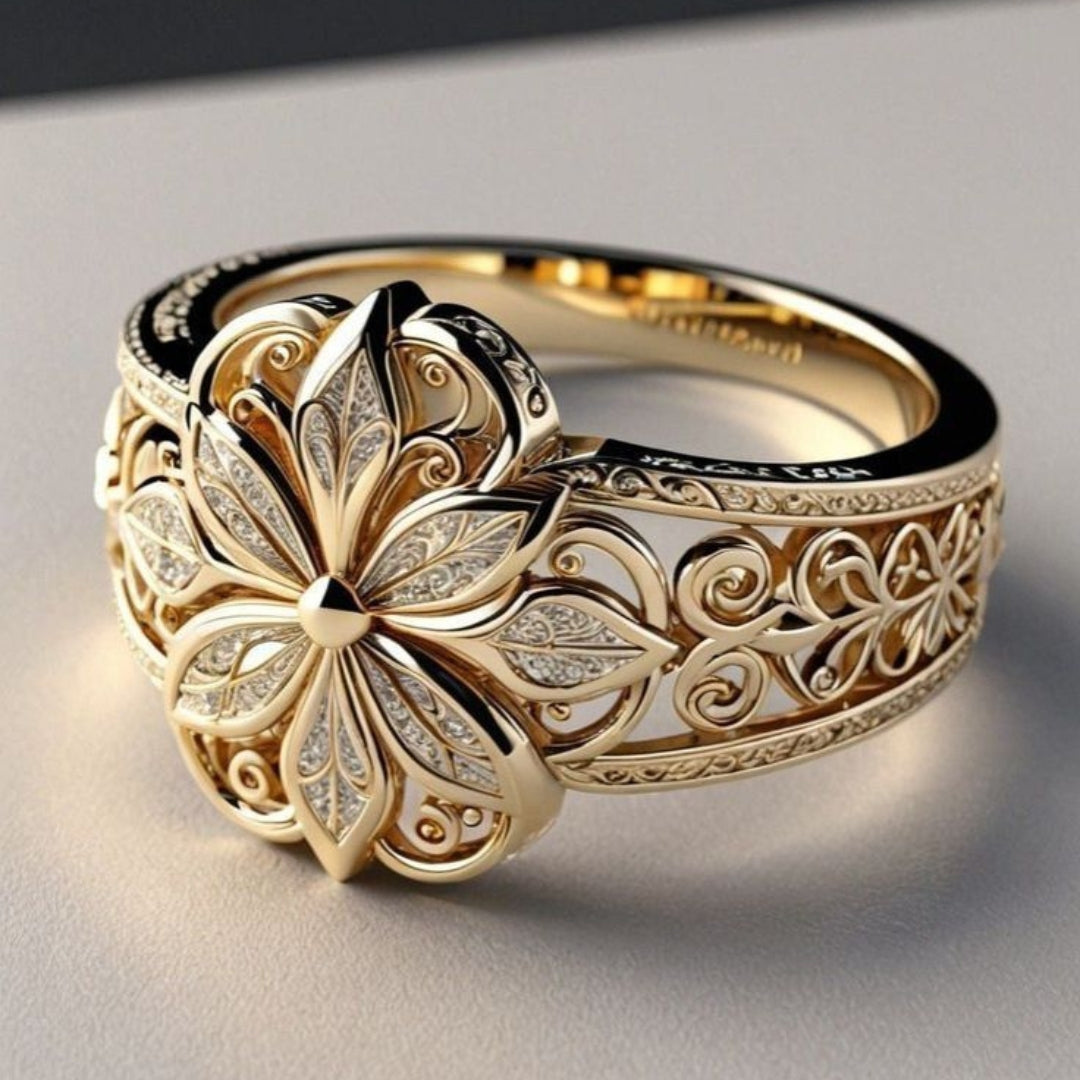 Anello dorato con zirconi floreali