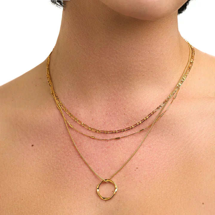 Collana a Cerchio Aperto a Tre Fili in Oro