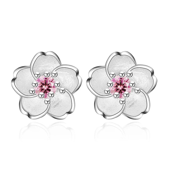 Orecchini a bottone a forma di fiore con zirconi