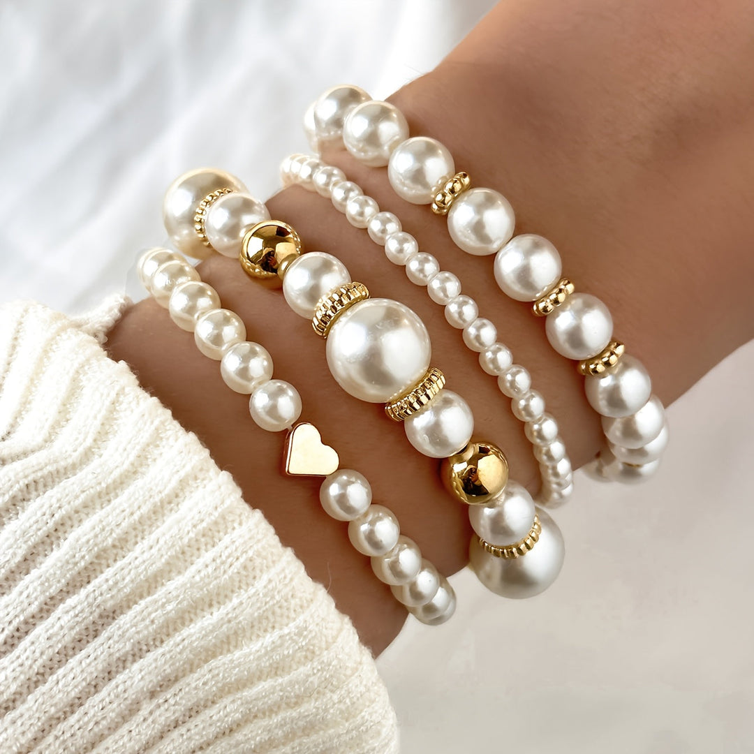 Set di bracciali eleganti a cuore con perle
