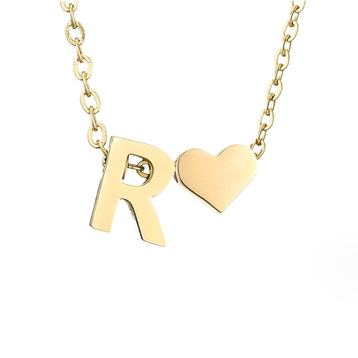 Collana con Iniziale Senza Tempo e Ciondolo a Cuore